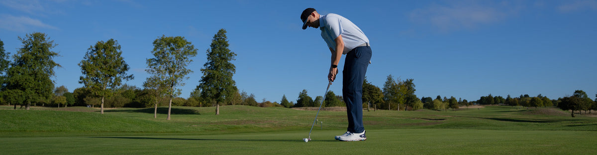 a golfer showcase golf clothing received in a mystery golf box